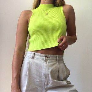 Green sleeveless turtle neck top